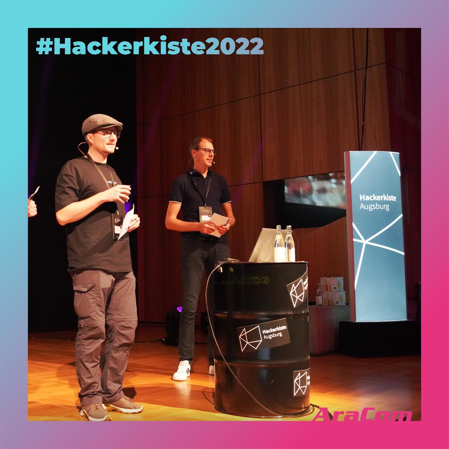 Daniel and Kai presenting a talk about software development at the Hackerkiste conference.